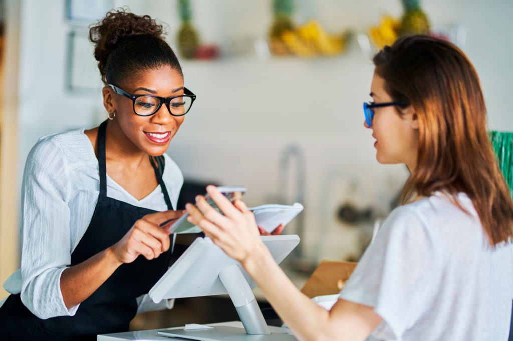 Mystery shopper auditing customer touch points such as cashier